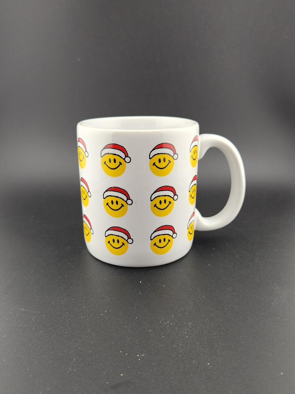 Vintage White Ceramic Mug with Yellow Smiley Santa Pattern